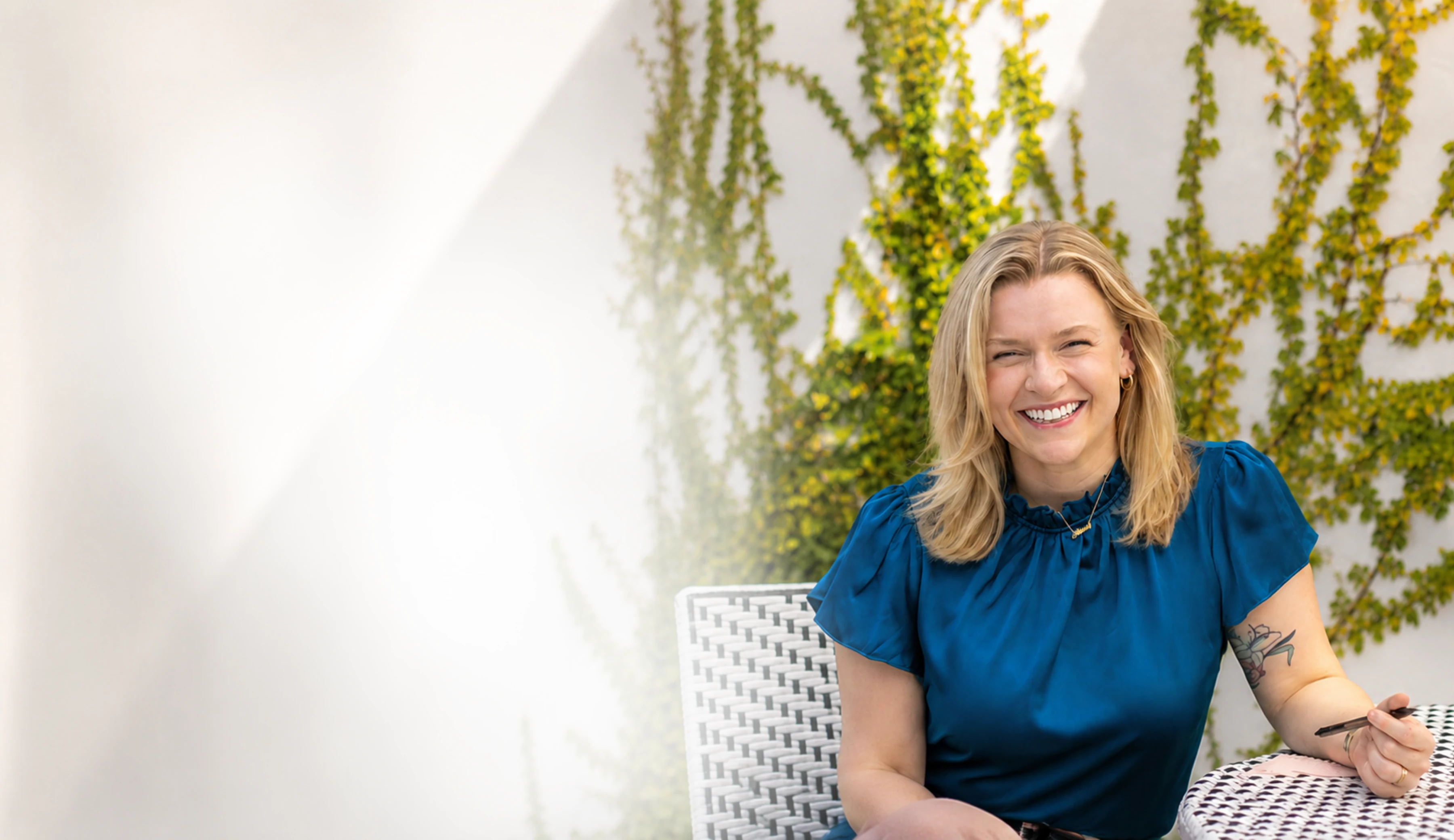 Mary Carmichael, founder of Carmichael Pro Studio, smiling outdoors